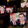 Детей в Сирии называют в честь российского президента (Сувениры с изображениями президента России Владимира Путина и президента Сирии Башара Асада | © AP P…) Сувениры с изображен…