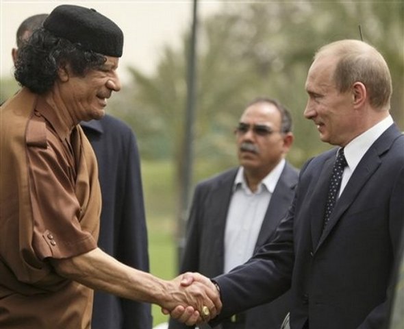 Муаммар Каддафи по о…